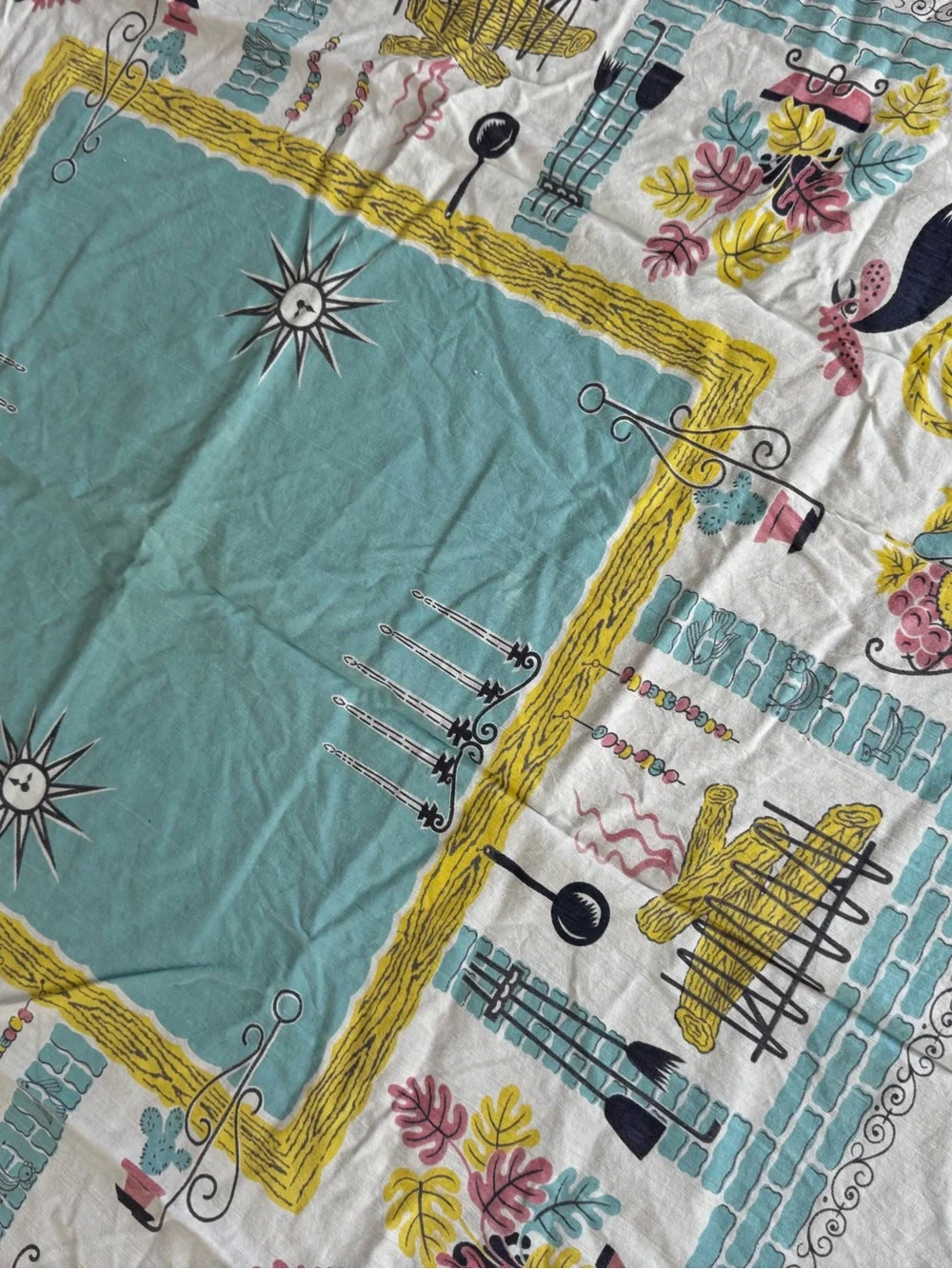Vintage charming mid-century tablecloth featuring a rooster design with border